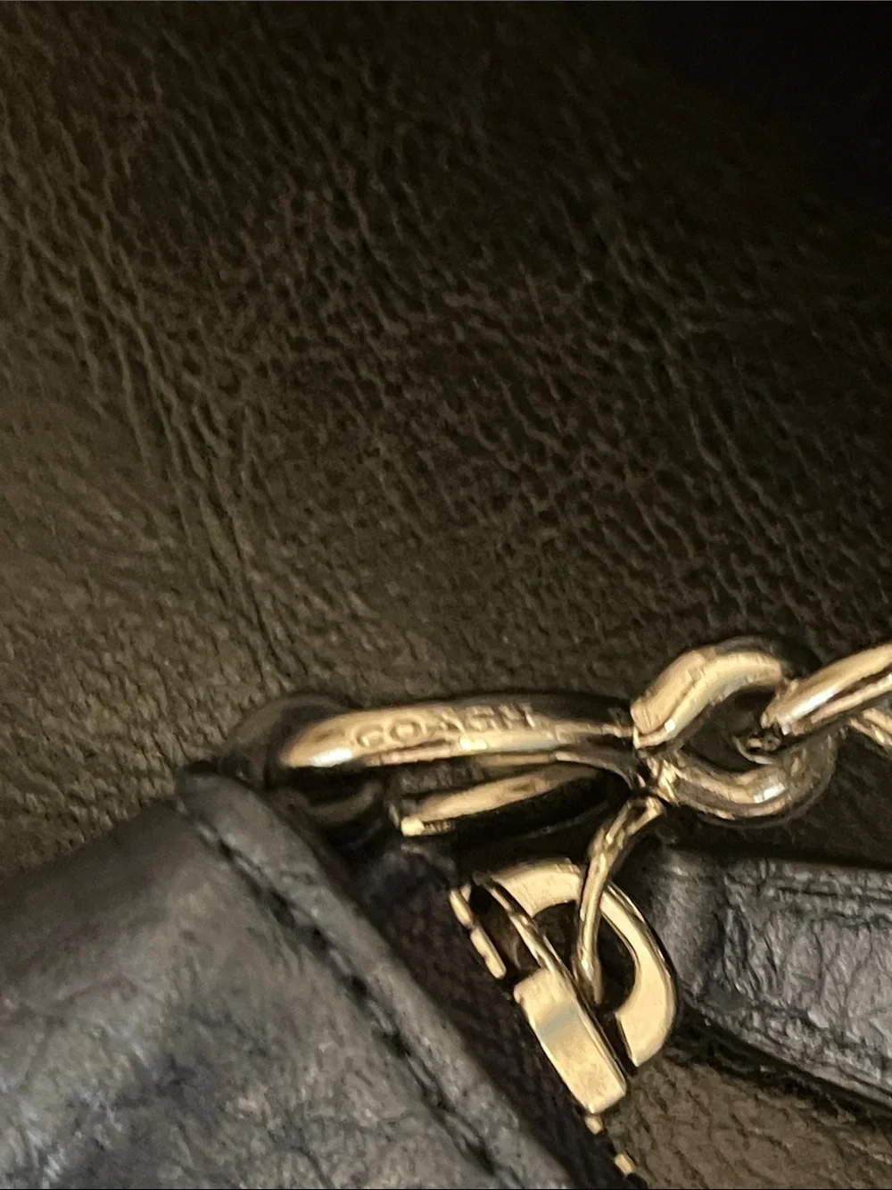 Metallic blue Coach crossbody purse